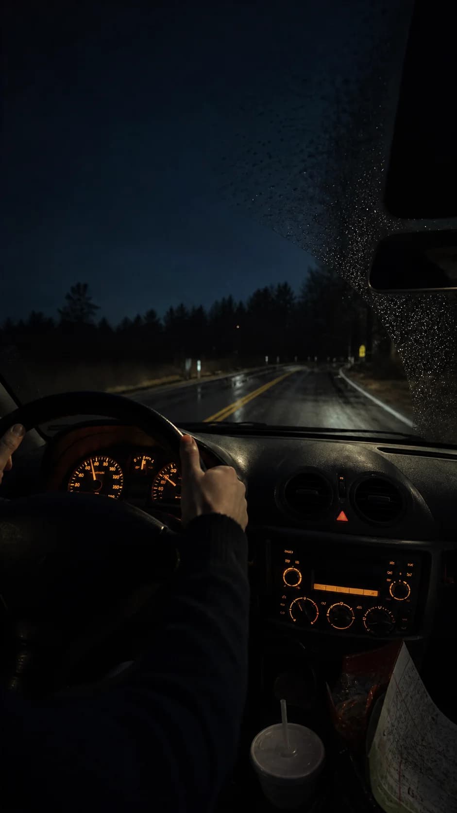 Dashboard view of a dark road